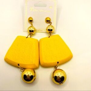 Earrings wooden in yellow. Light weight pierced!
